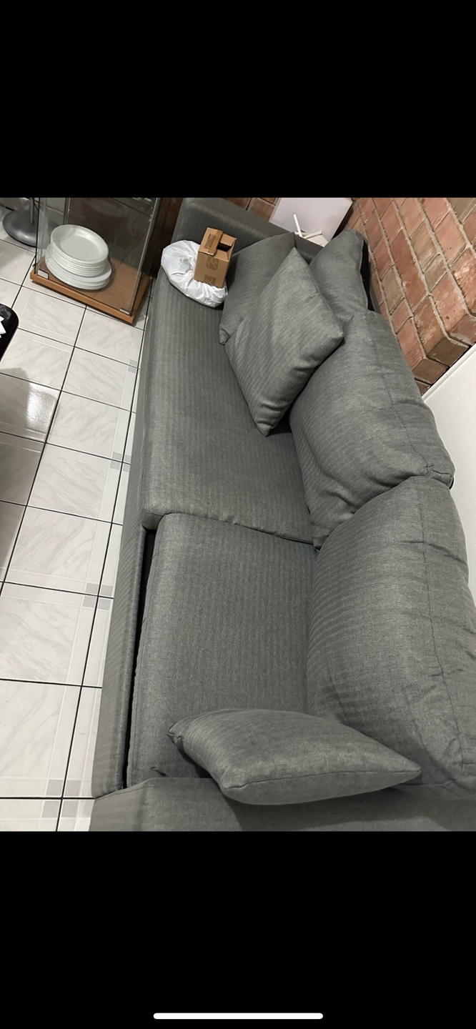 Grey Sectional Sofa with Three Cushions