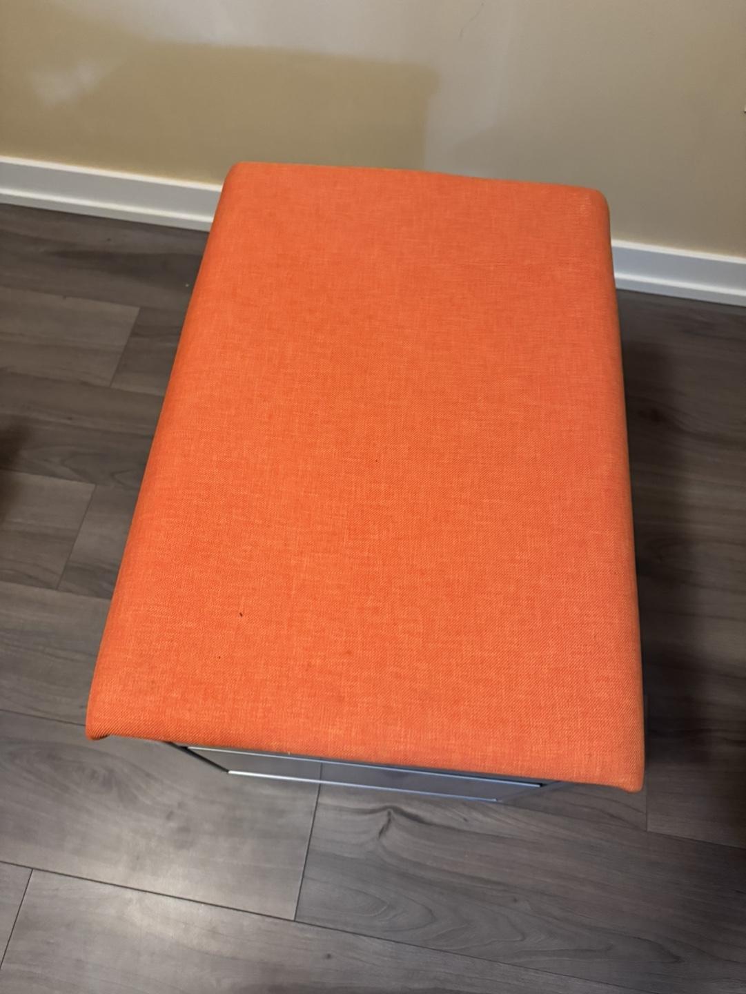 File Cabinet with Orange Cushion Top