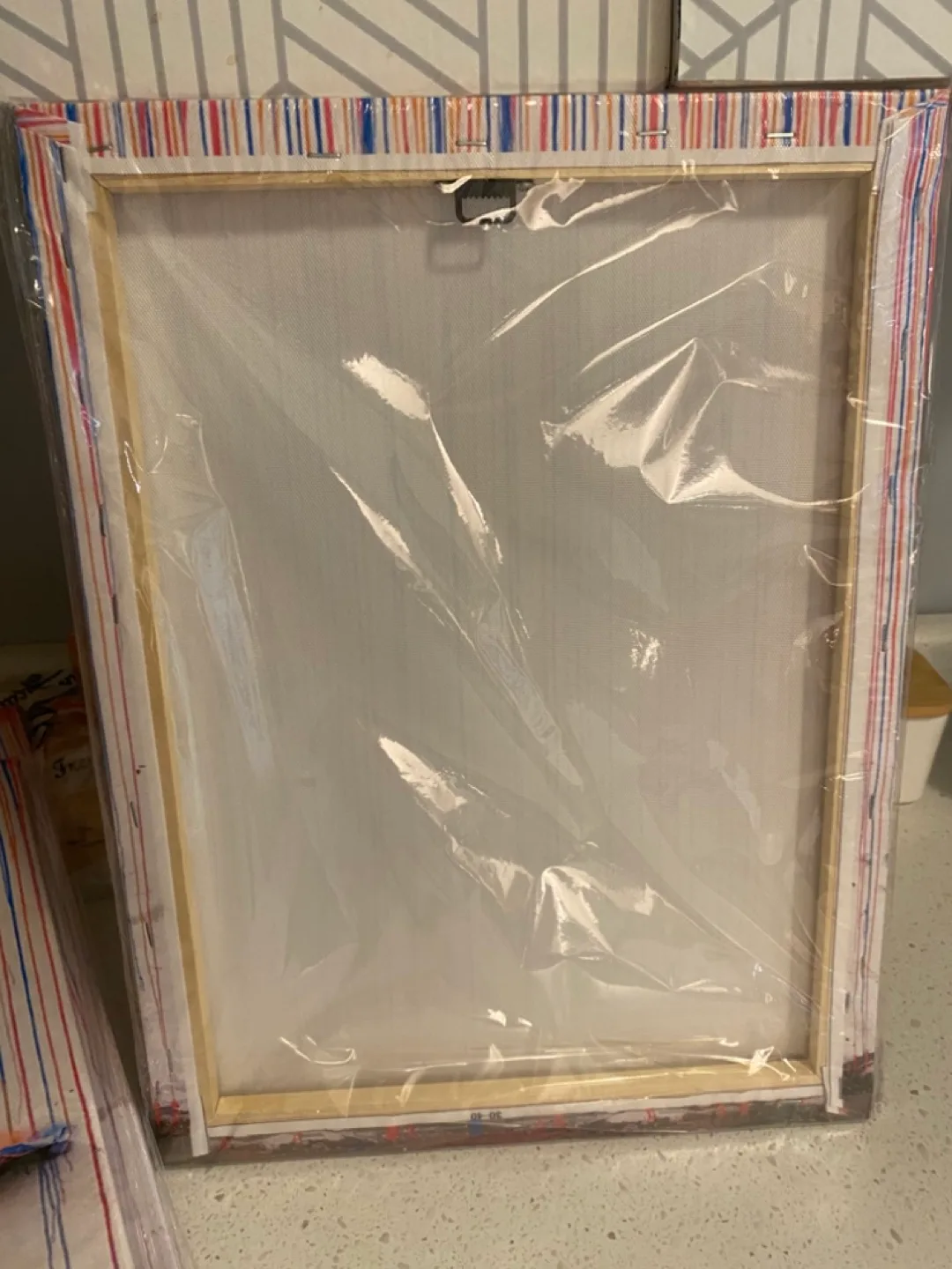 Set of three Banksy-style rain canvas prints image indicator(4)