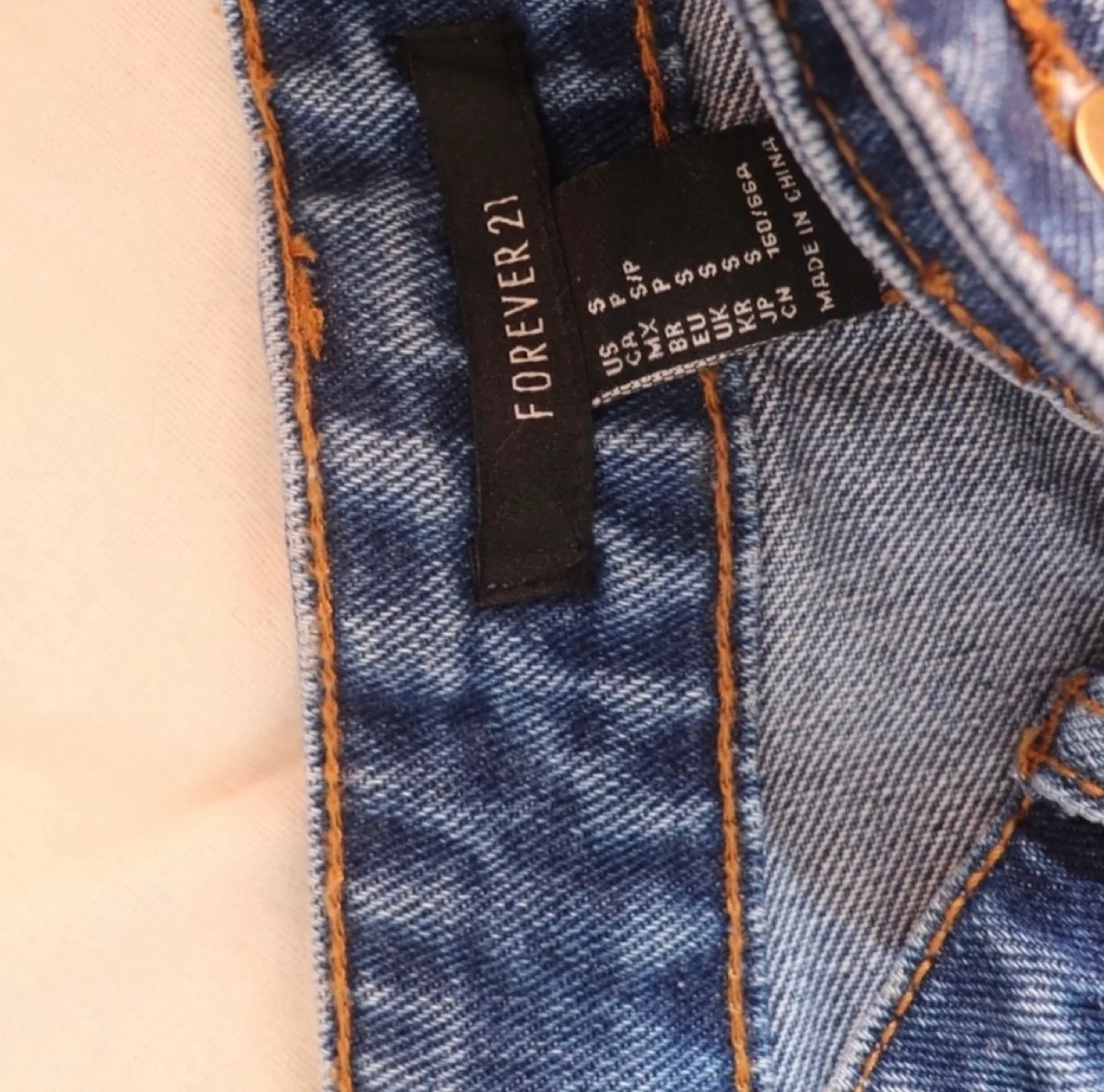Forever 21 Denim Mini Skirt with Patches image indicator(2)