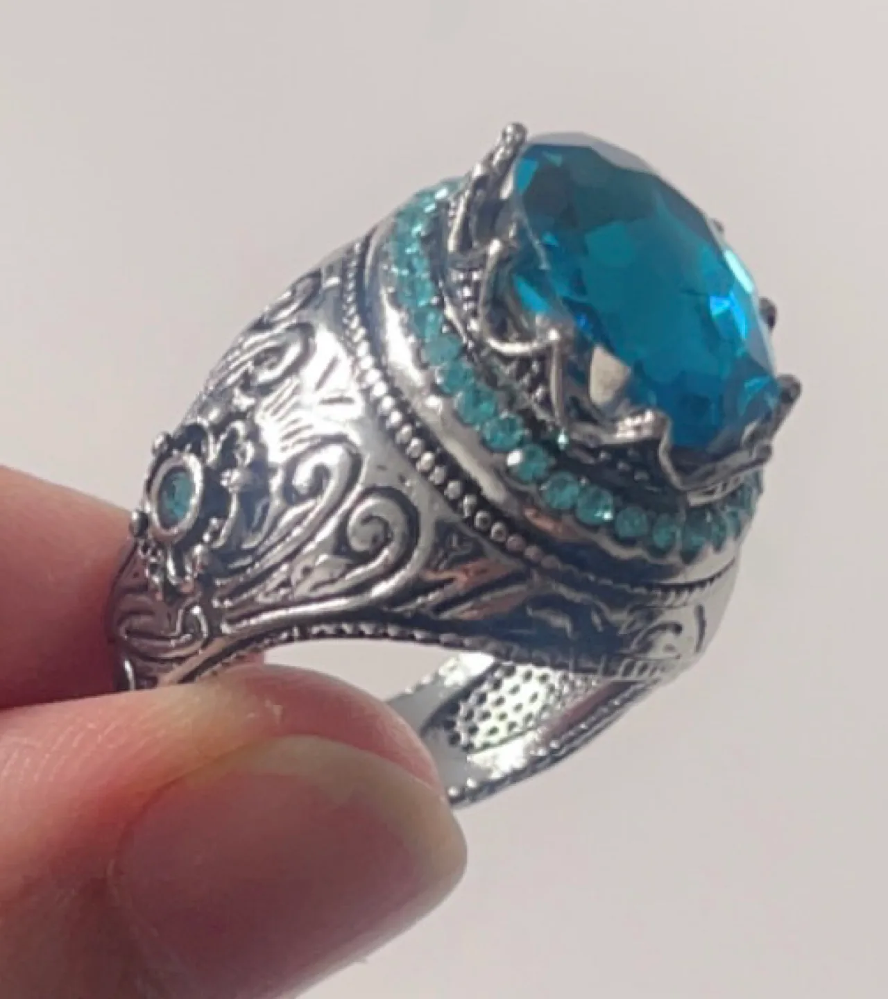 Elegant Men's Statement Ring with Blue Gemstone and Silver Band image indicator(5)
