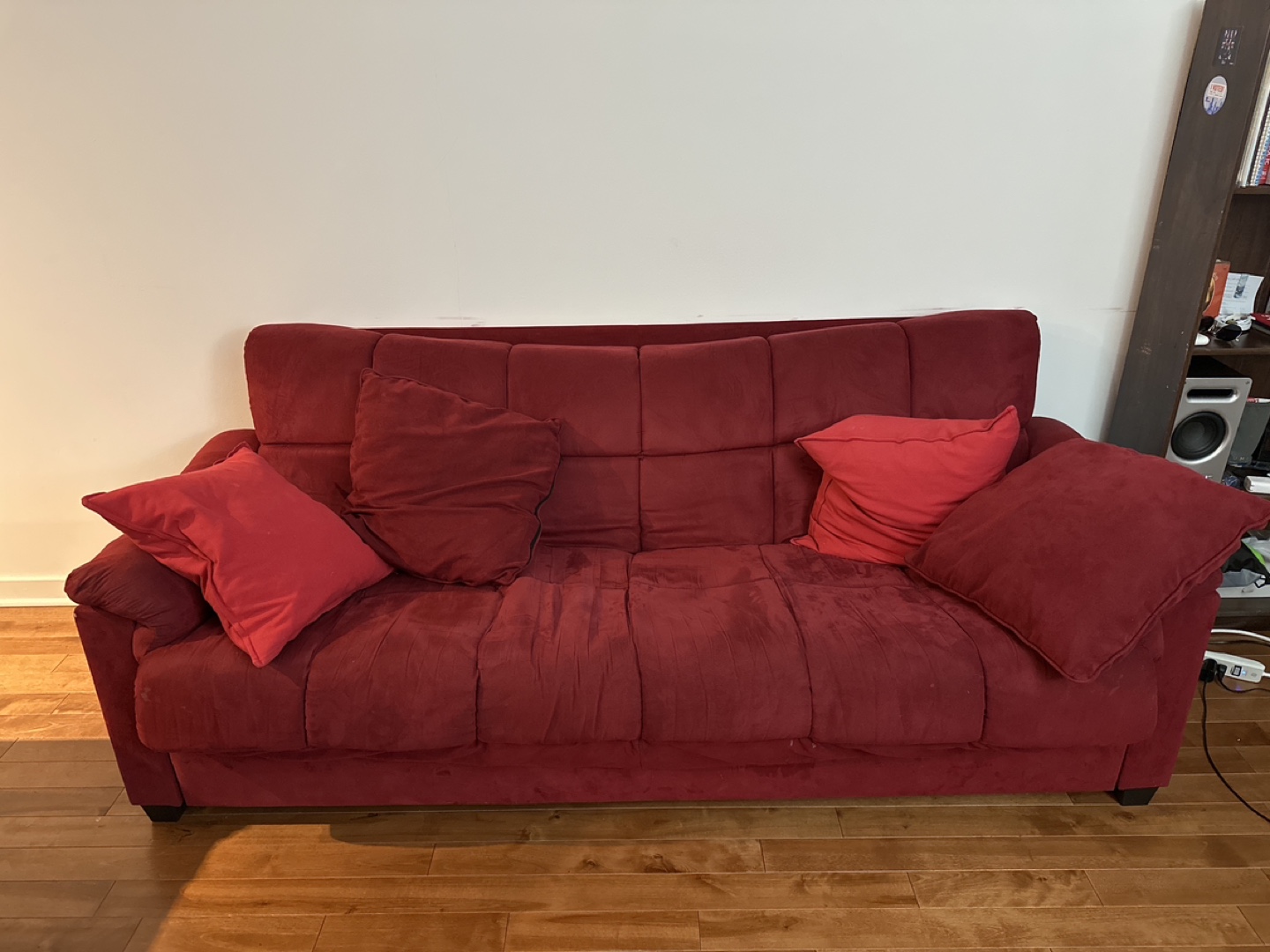 Red Sofa Bed with Pillows