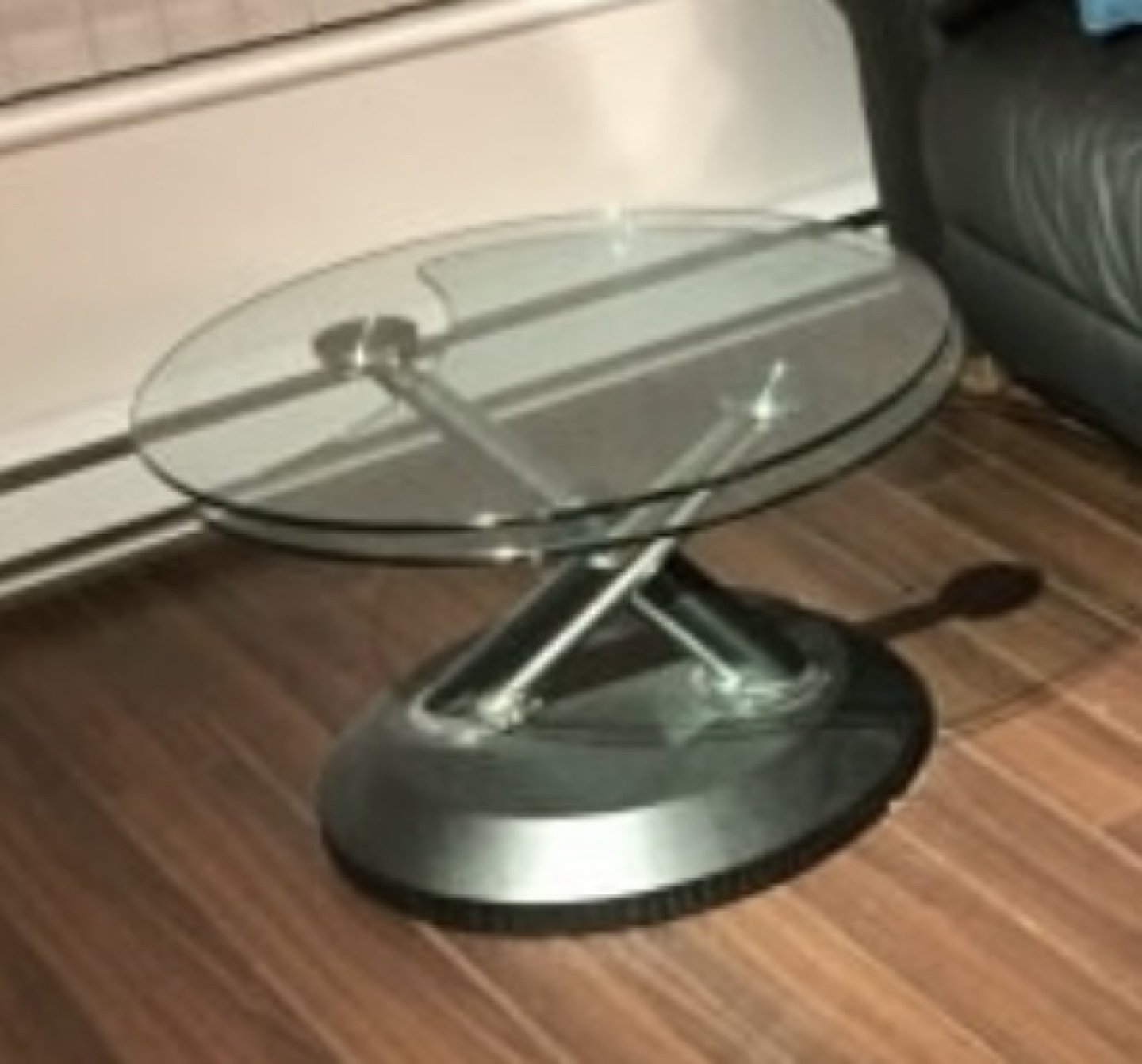 Glass coffee table opens to two tops