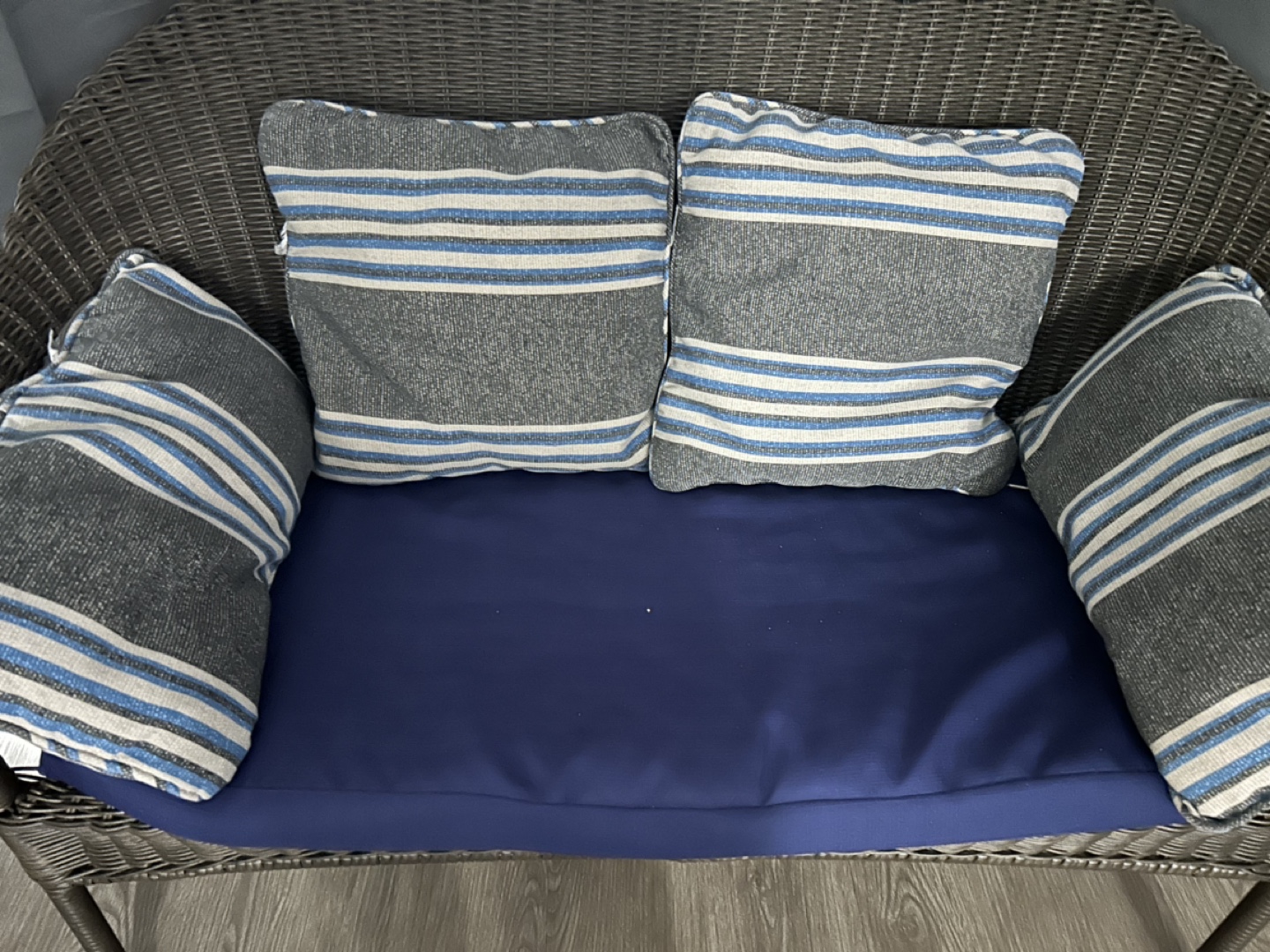 Wicker Patio Love Seat (throw pillow not included)