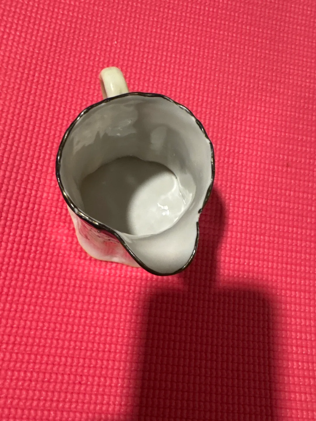 Vintage Porcelain Creamer with Floral Design image indicator(3)