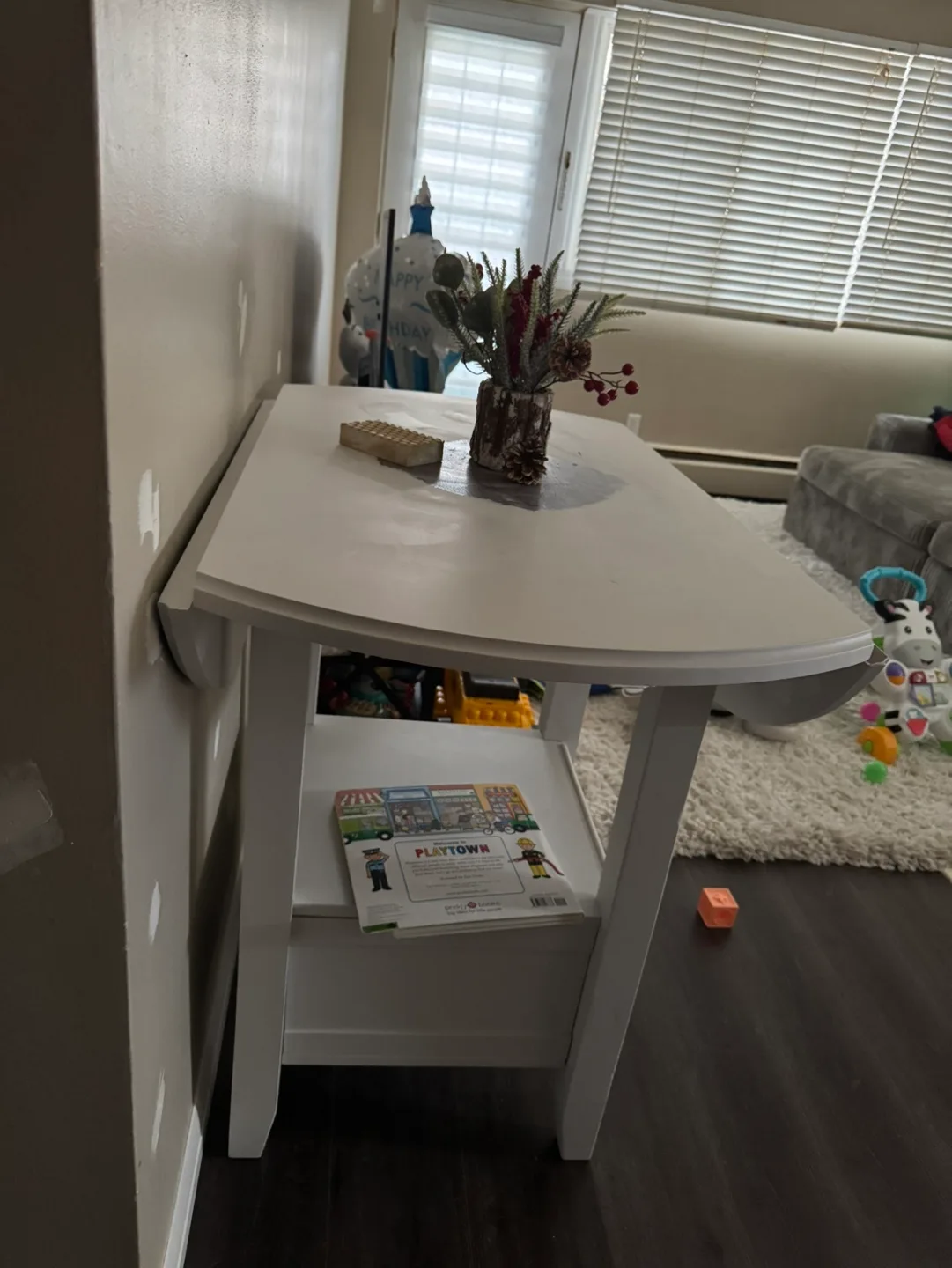 White drop leaf table with storage image indicator(2)