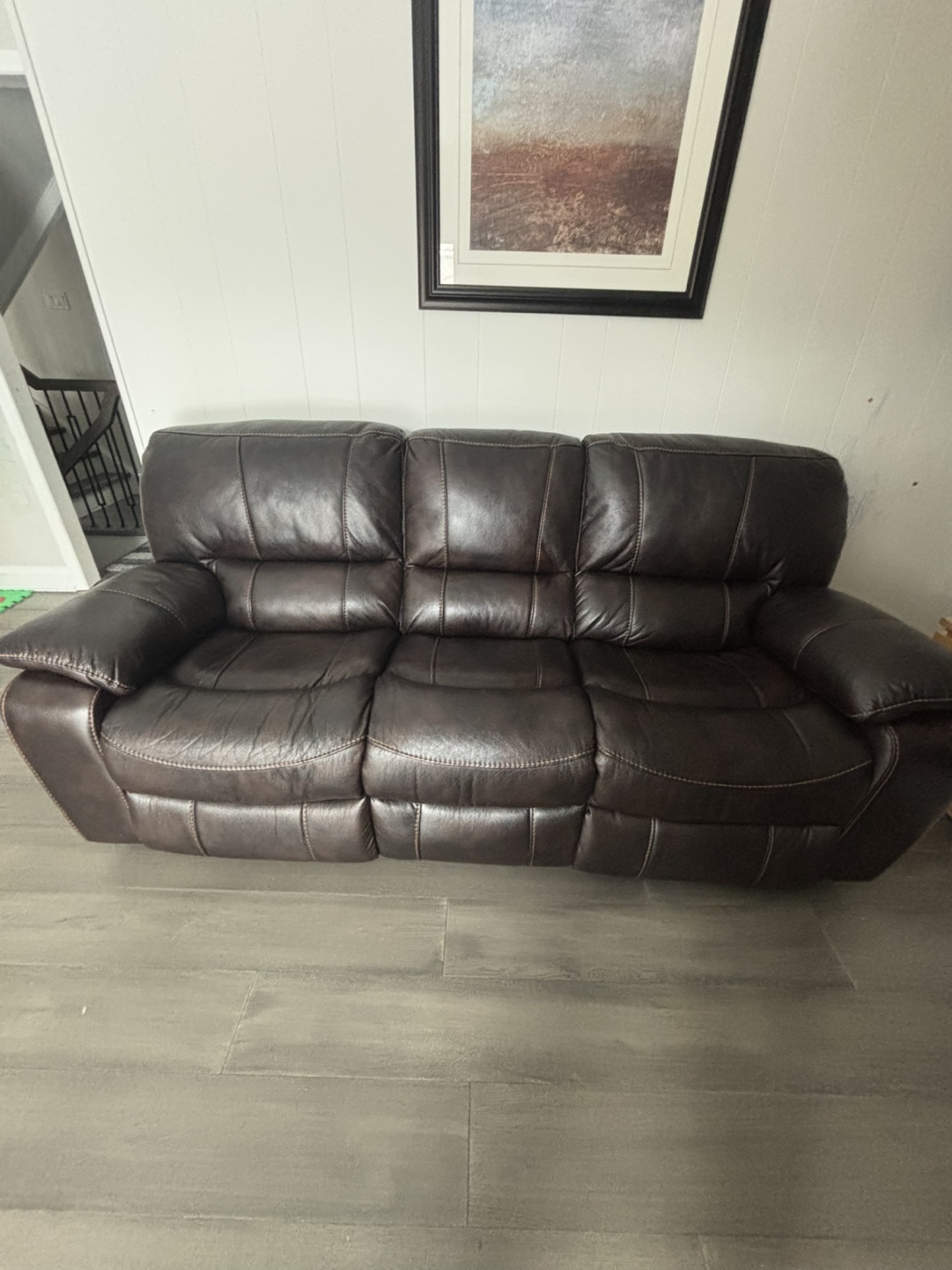 Leon’s - Brown Leather Reclining Sofa - photo 2