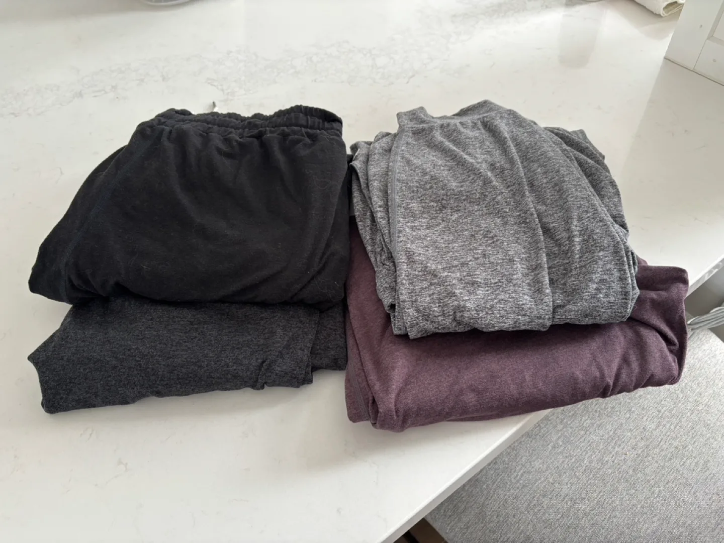 Four pairs of Vuori noLounge Pants - Size Medium thumbnail