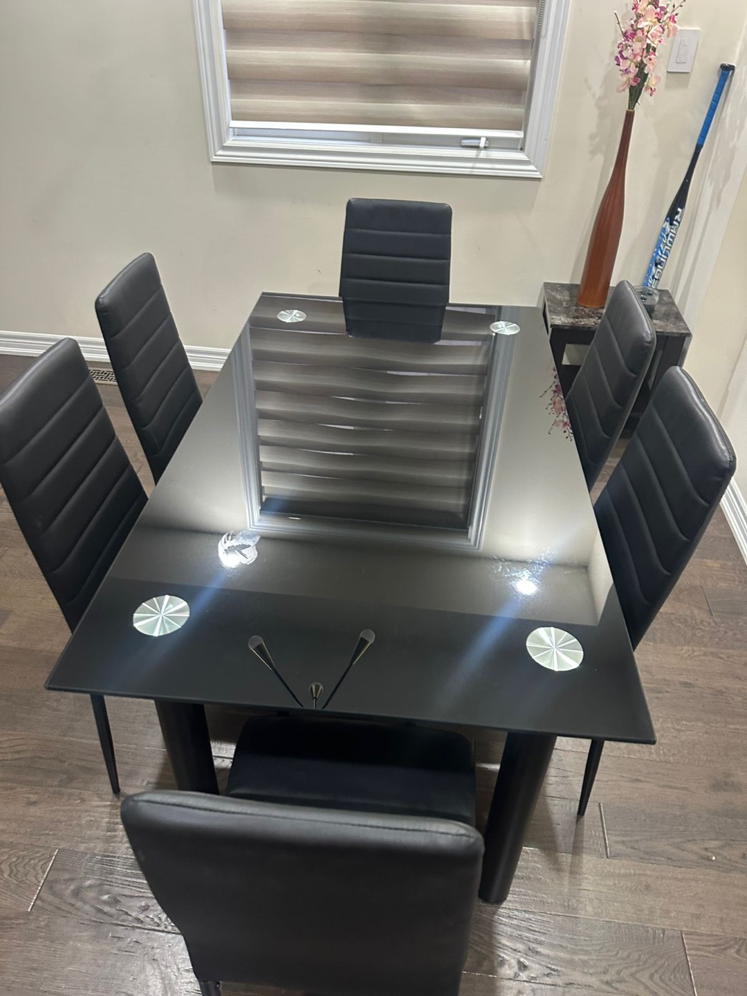 Dining table (glass) with five chairs (leather)