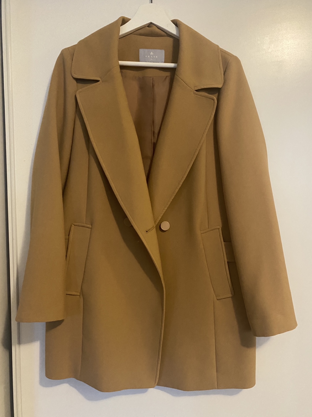 Taupe coloured, longline, double-breasted coat