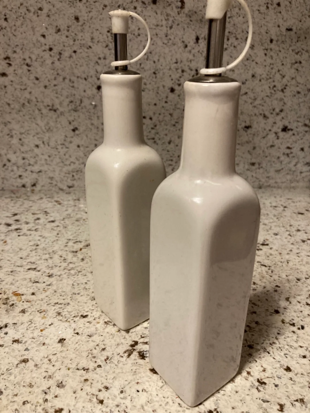 Pair of White Ceramic Oil and Vinegar Cruets image indicator(3)