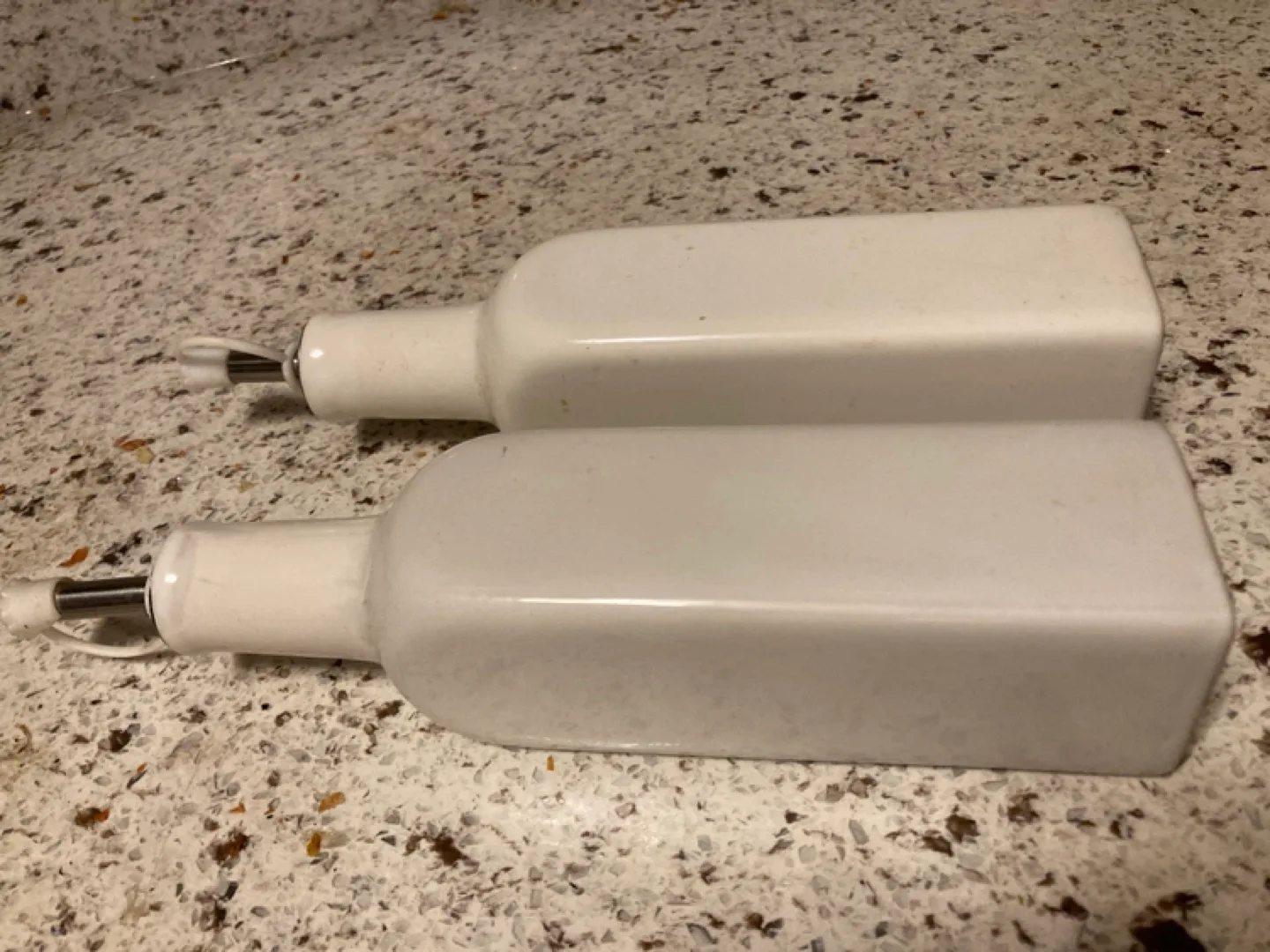 Pair of White Ceramic Oil and Vinegar Cruets image indicator(2)
