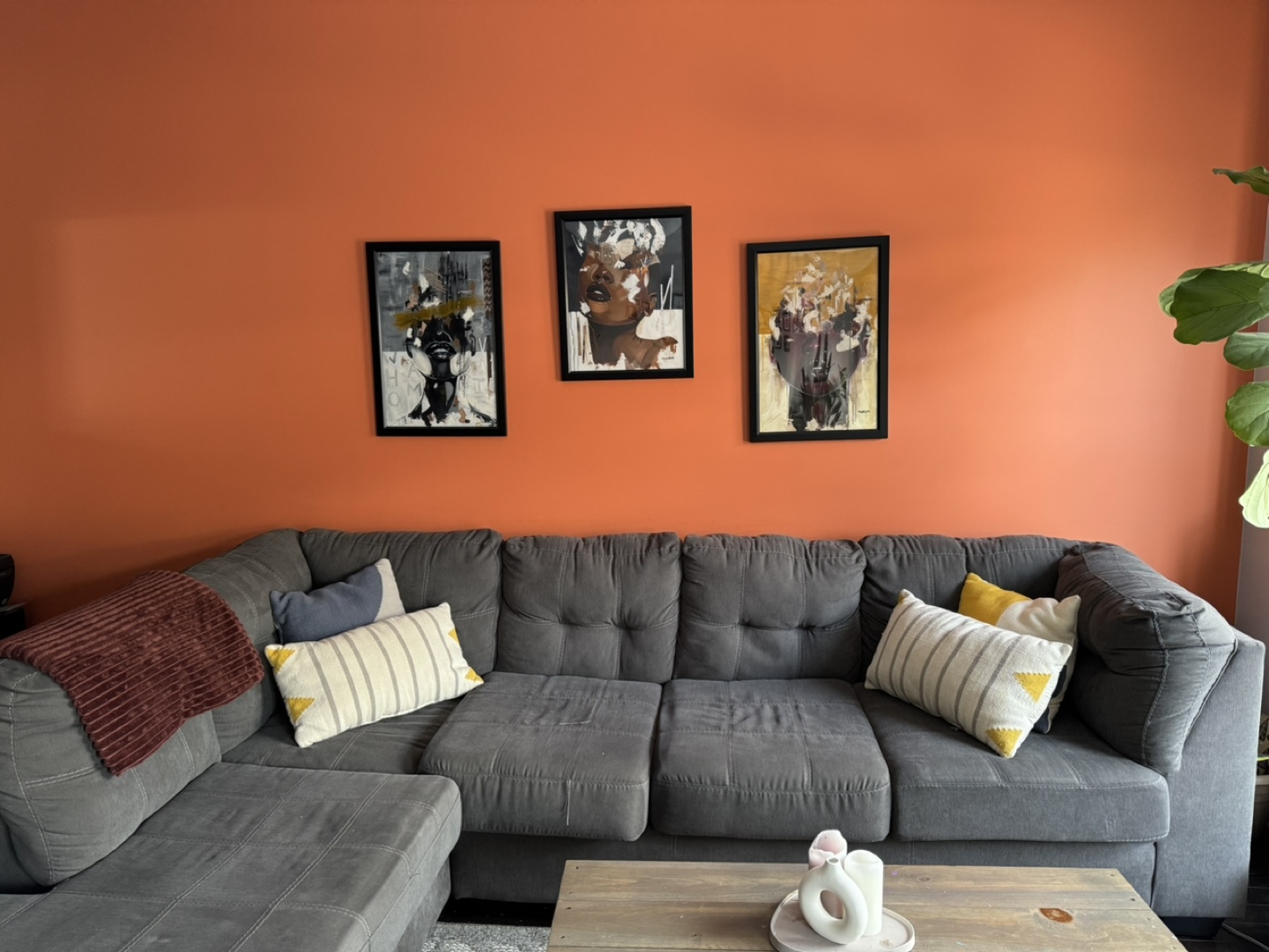 Grey L-Sectional with 4 throw pillows