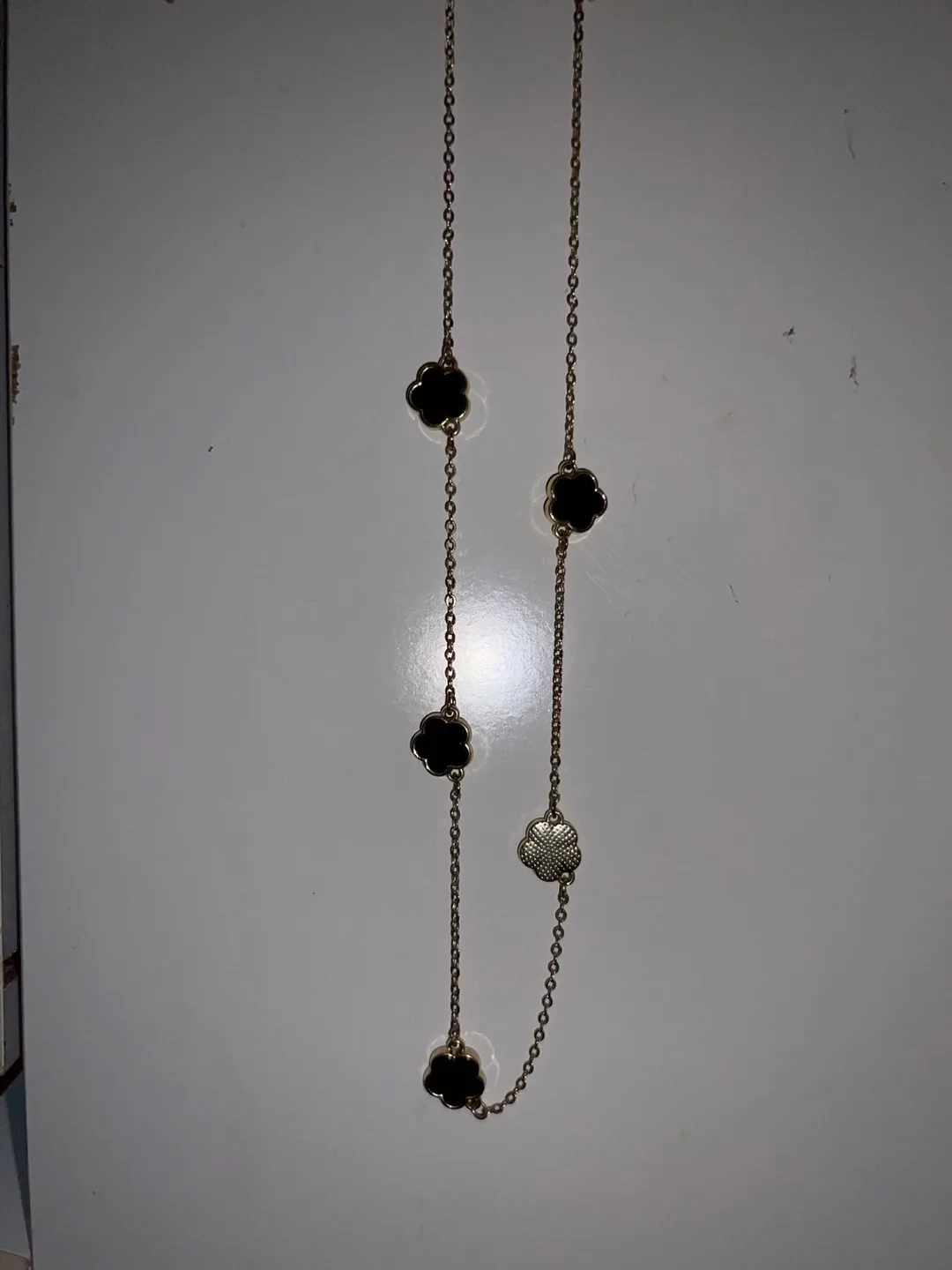 Gold Chain Bracelet and Necklace Set with Black Flower Charms image indicator(2)