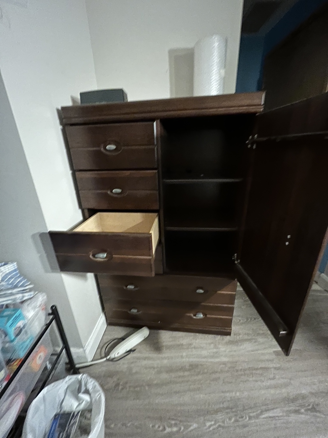 Dark brown wooden chest of drawers with wardrobe