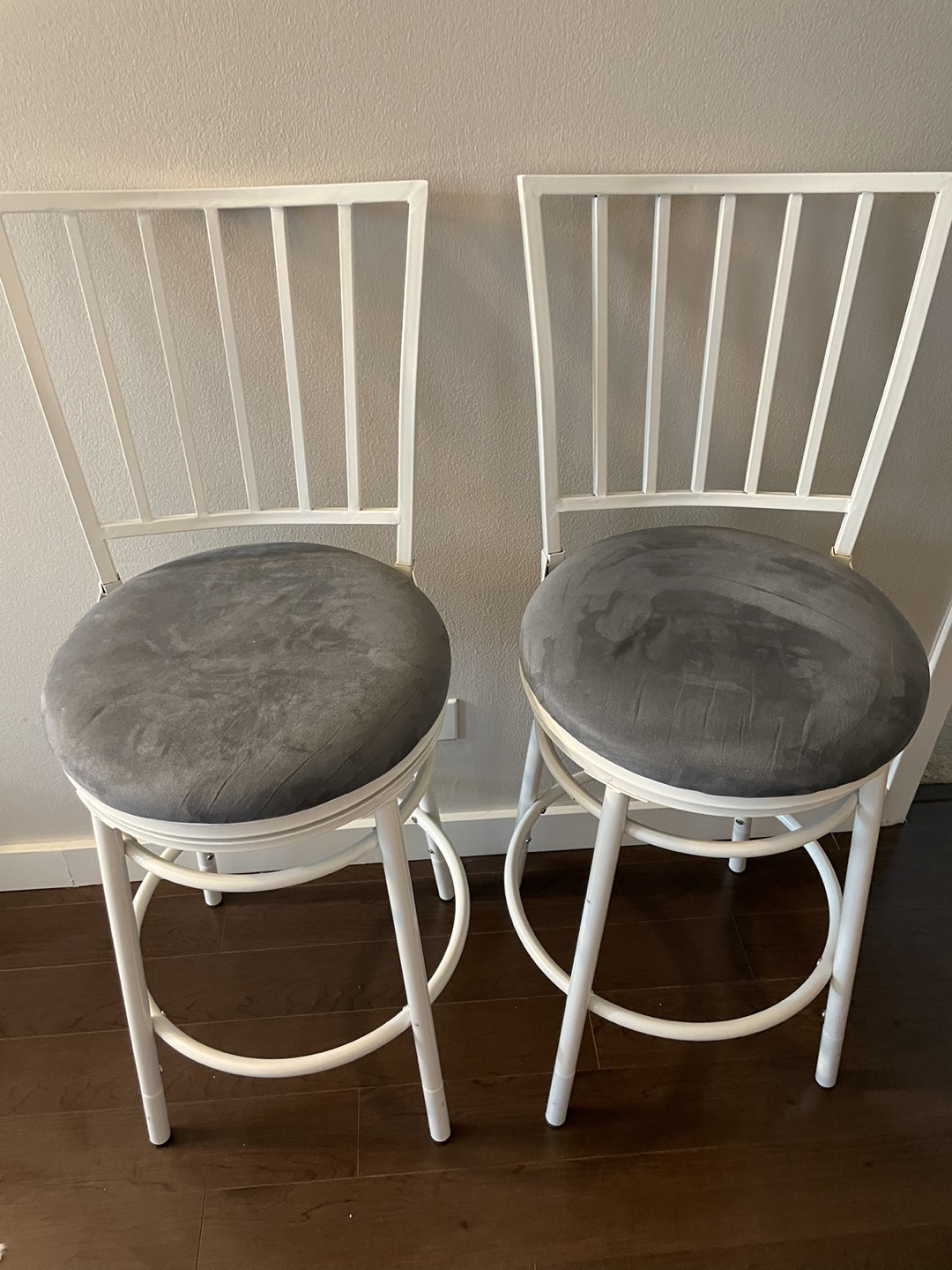 Pair of White Metal Swivel Bar Stools with Grey Cushions - photo 4