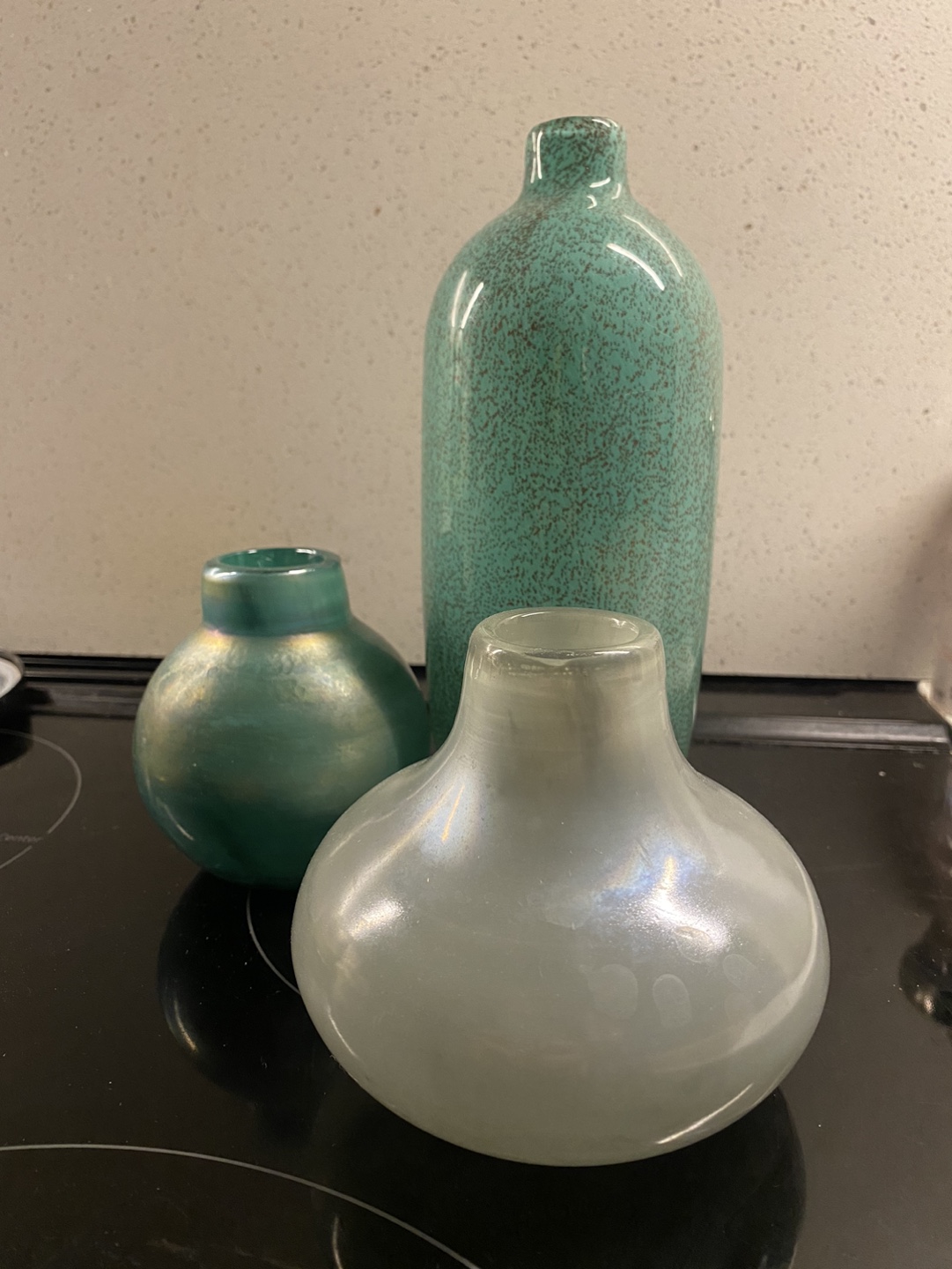 Set of three decorative glass vases