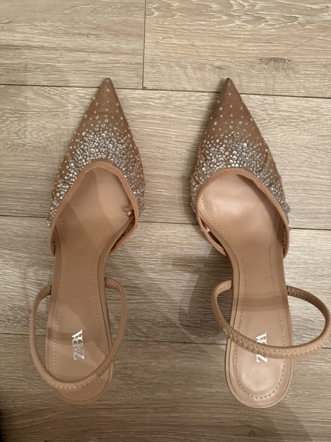 Beige embellished high heels