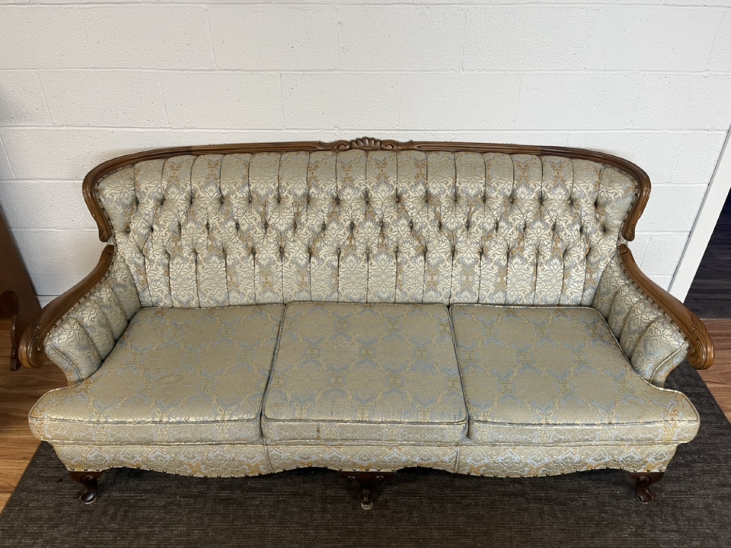 Vintage couch with wood detailing