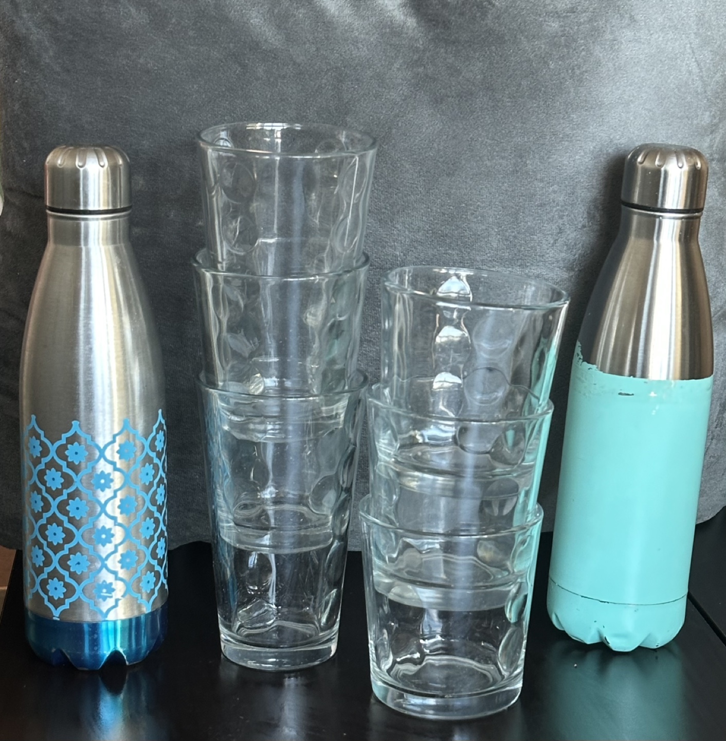 Six Glasses and Two Stainless Steel Water Bottles