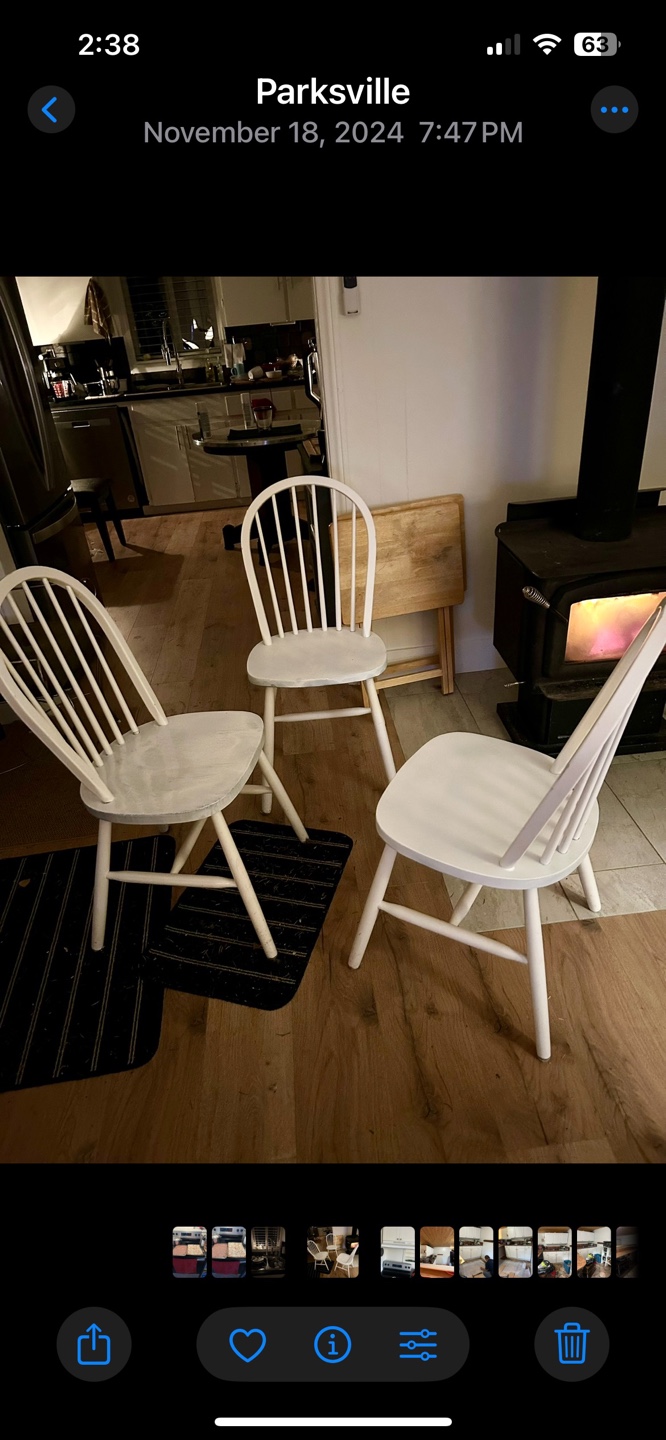 Set of four white Windsor chairs