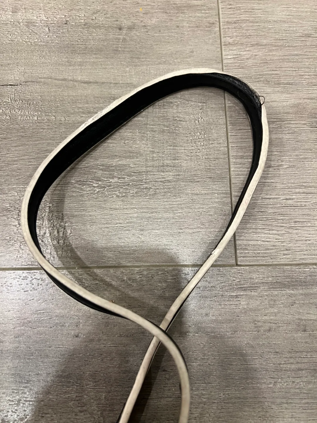 Black studded crossbody bag with colourful tassels image indicator(6)