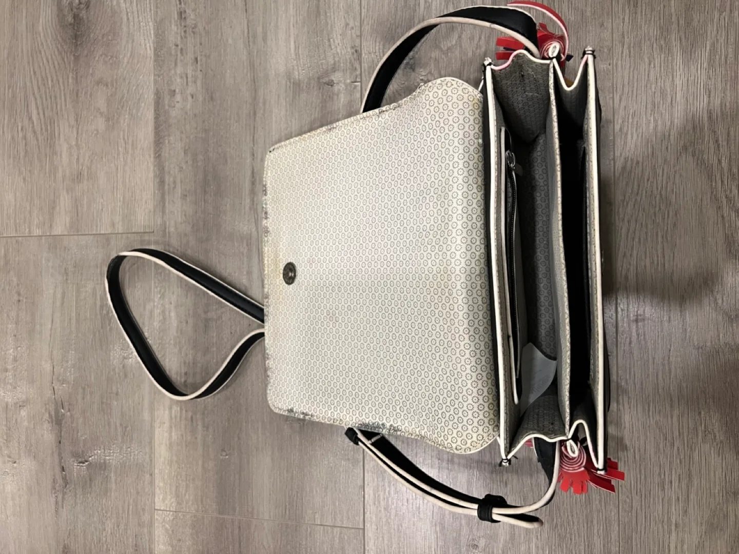 Black studded crossbody bag with colourful tassels image indicator(8)