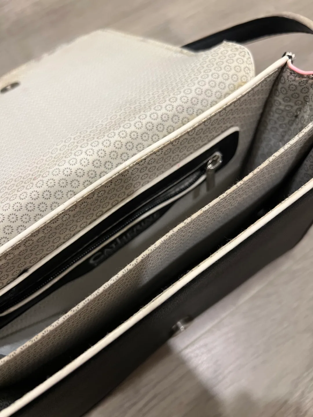 Black studded crossbody bag with colourful tassels image indicator(9)