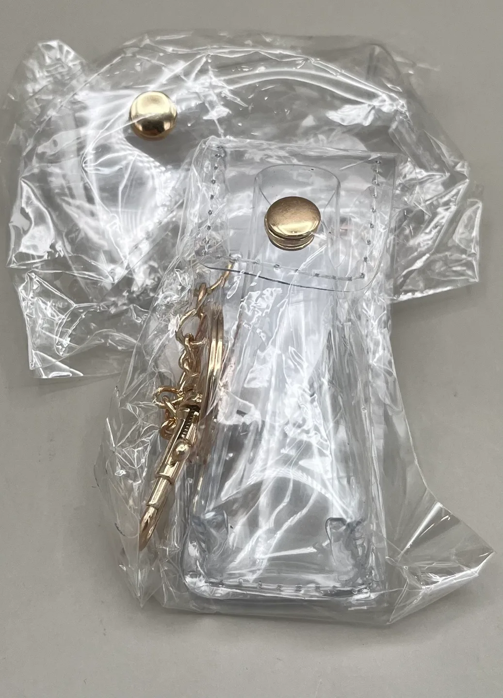 Two Clear Keychain Cases with Gold Hardware image indicator(2)