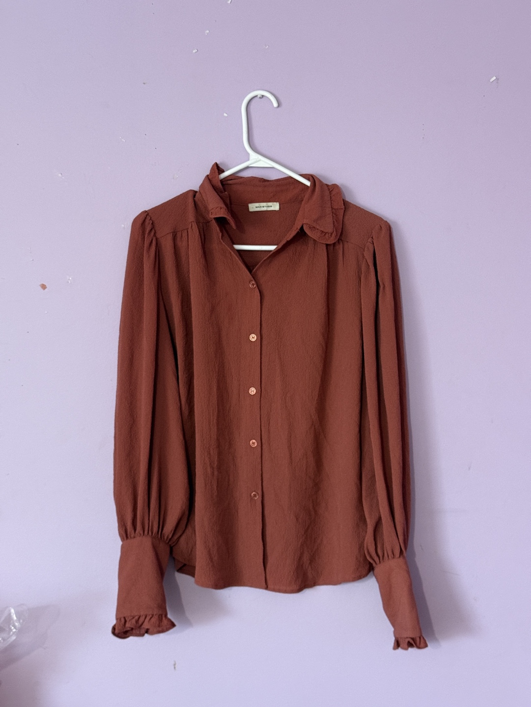 Rust-coloured long-sleeve blouse