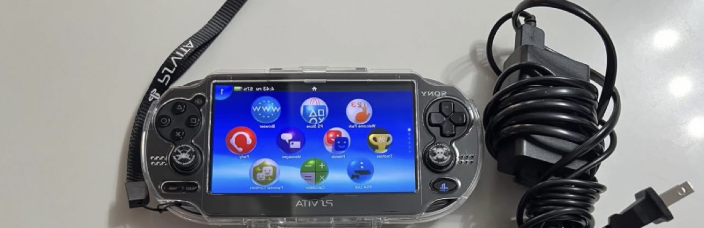 Sony PlayStation Vita with Case and Charger