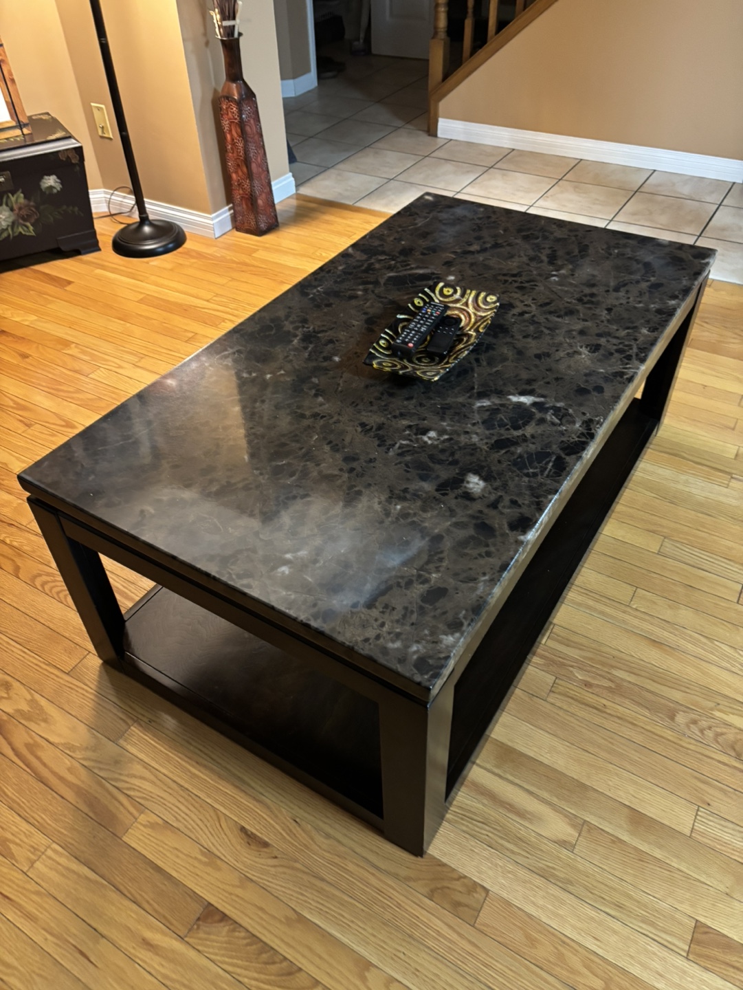 Dark brown marble top coffee table