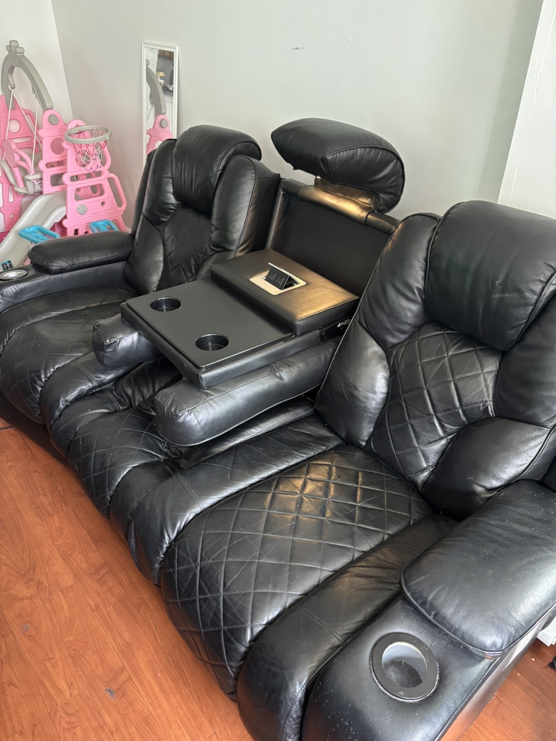 Black Leather Power Reclining Sofa with Console
