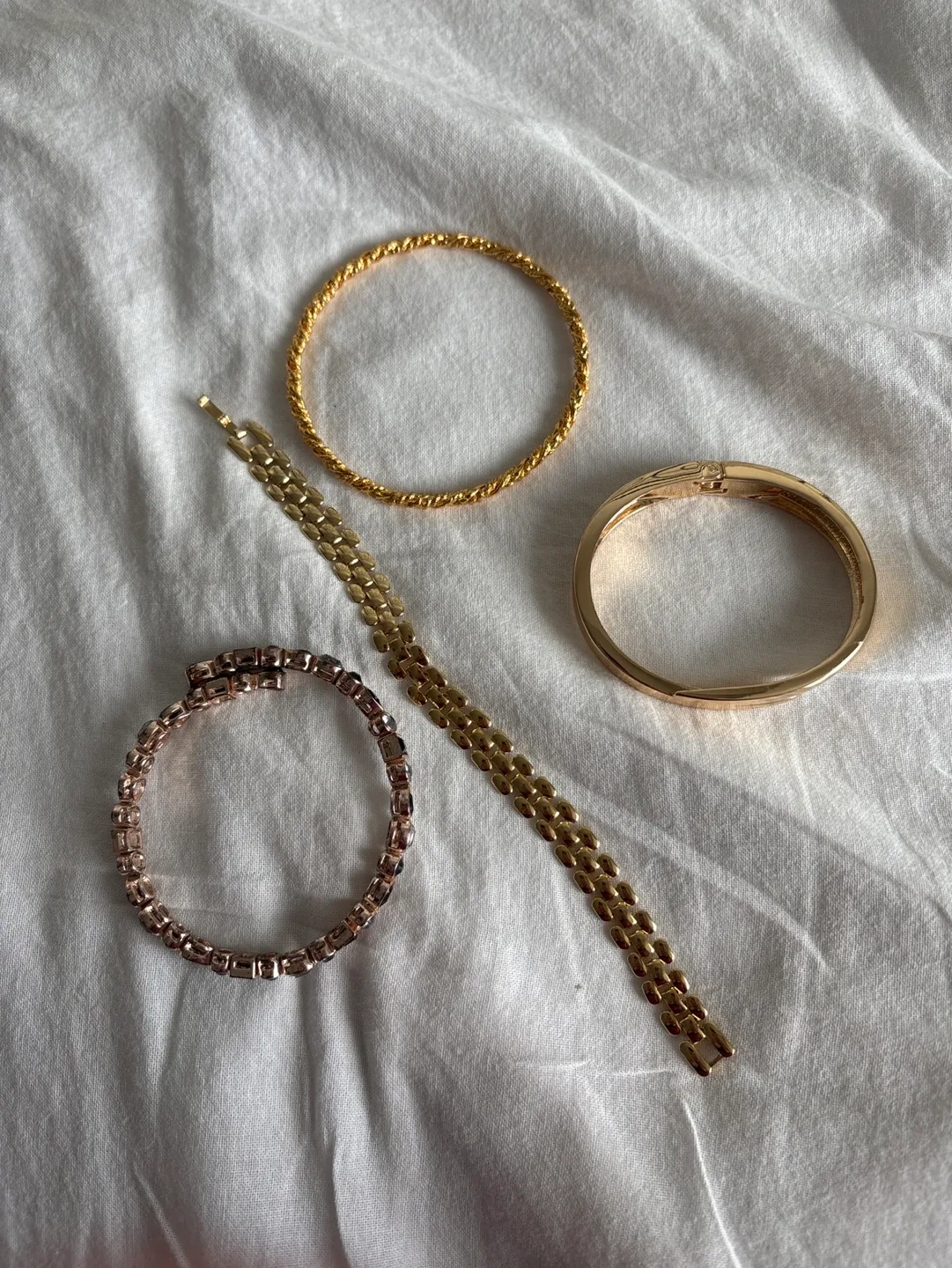 Four Gold Tone Bracelets thumbnail