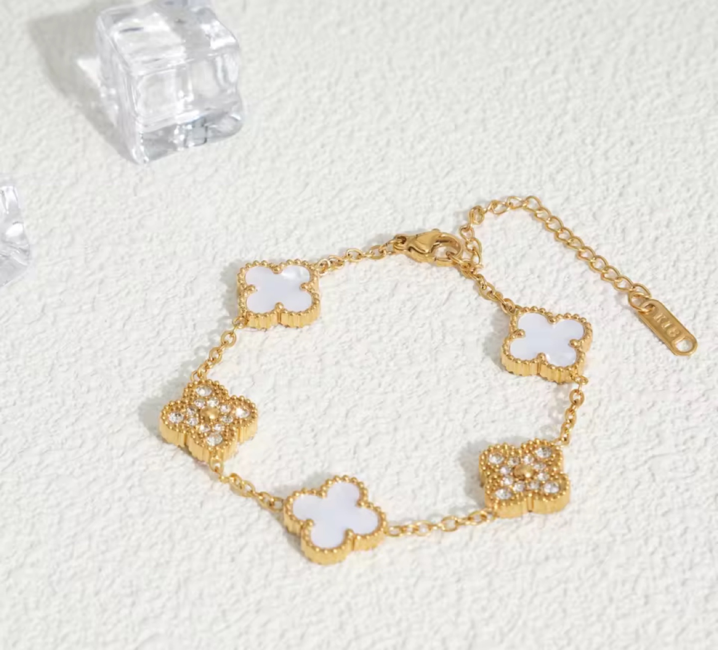 Elegant Gold Clover Bracelet with Various Coloured Stones