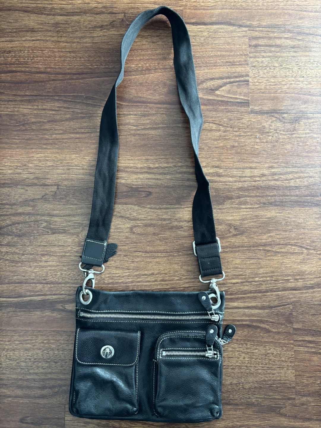 Roots Black Leather Crossbody Bag with Multiple Pockets