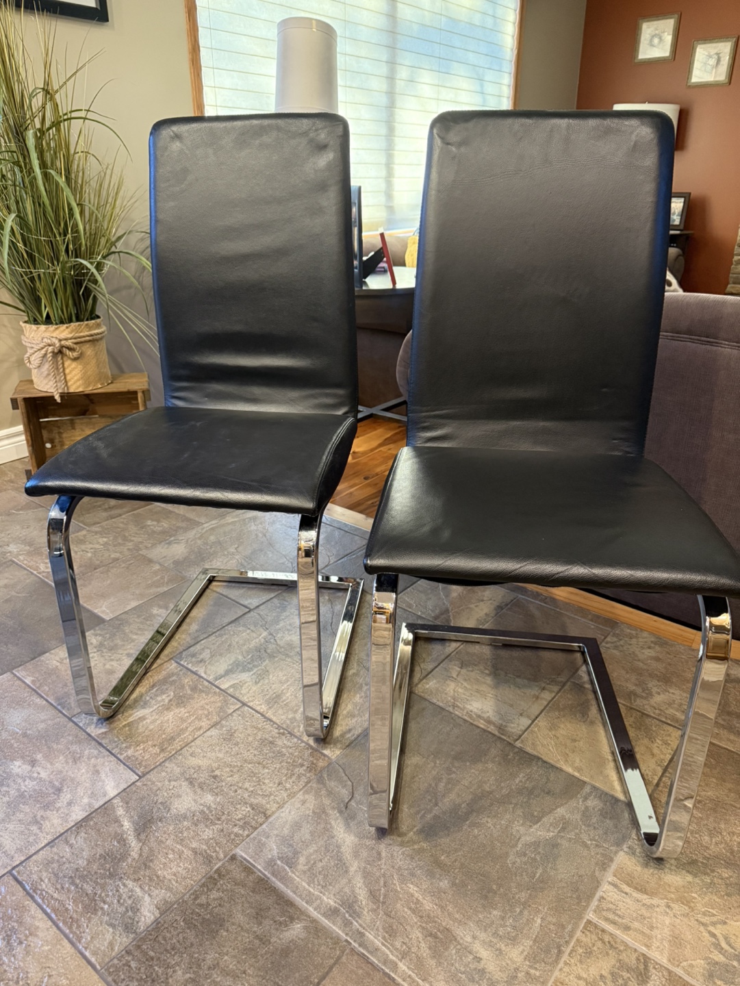 Pair of Black Leather Dining Chairs with Chrome Legs