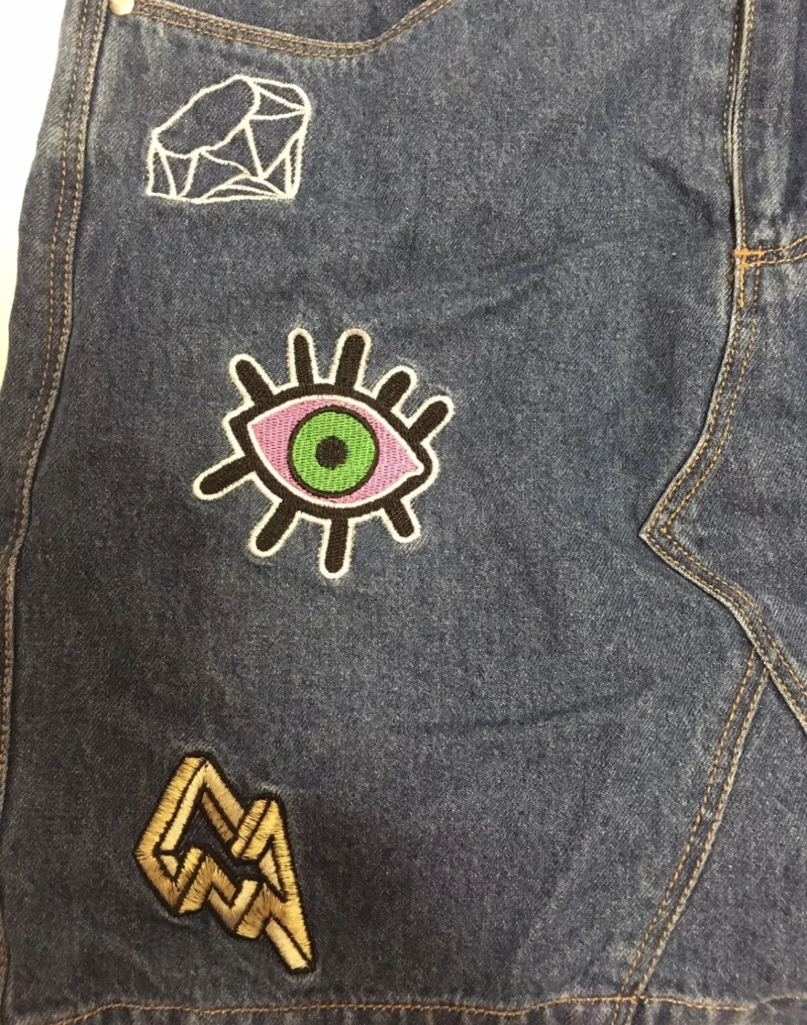 H&M women’s denim blue jean skirt size 6 embroidered rainbow image indicator(3)