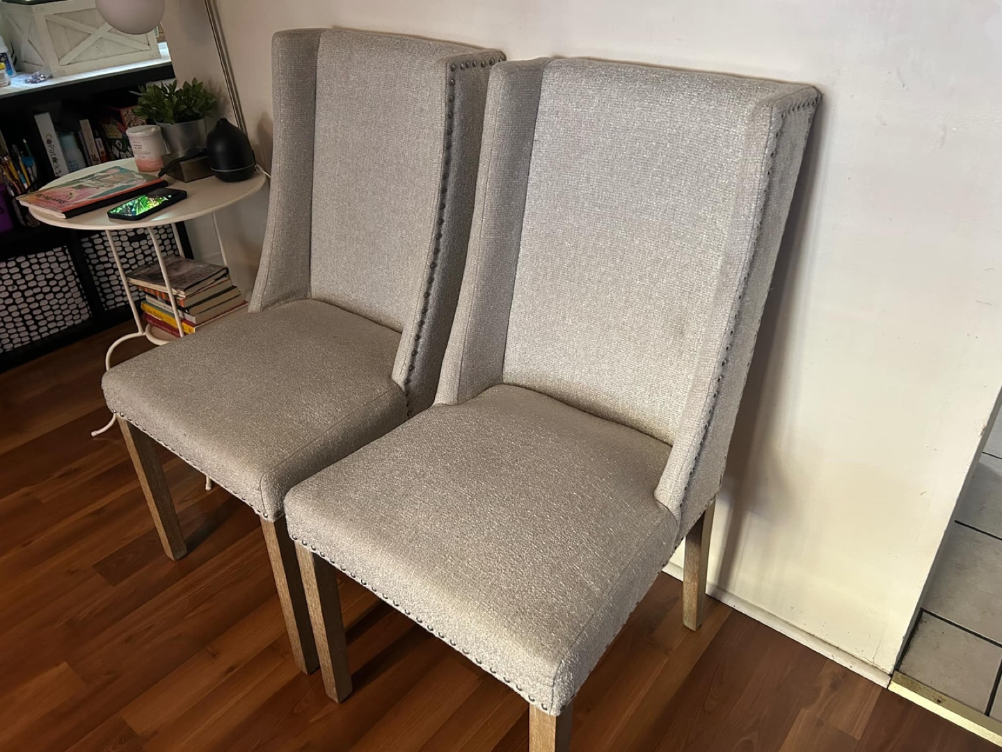 Pair of Grey Fabric Dining Chairs with Light Wood Legs