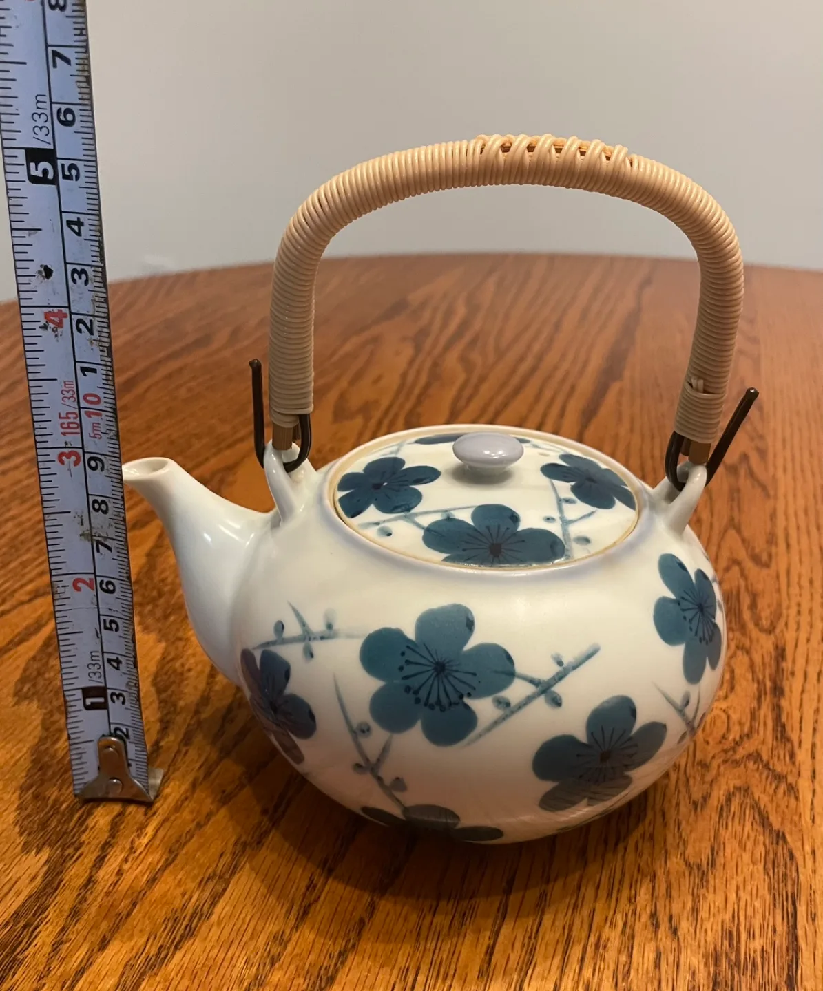 Japanese-style teapot with floral design image indicator(4)