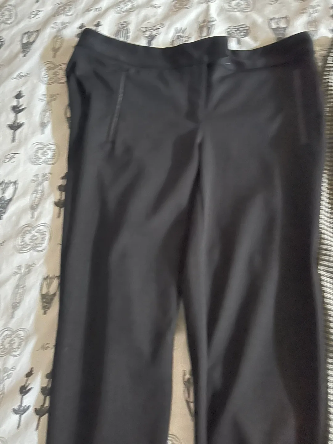 Three pairs of women's dress pants image indicator(2)