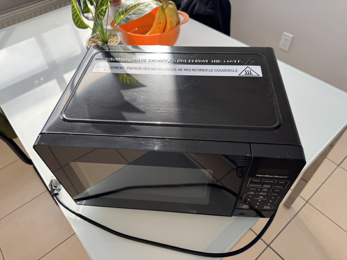 Microwave - brand: Hamilton Beach Black 0.7 cu ft. - photo 4