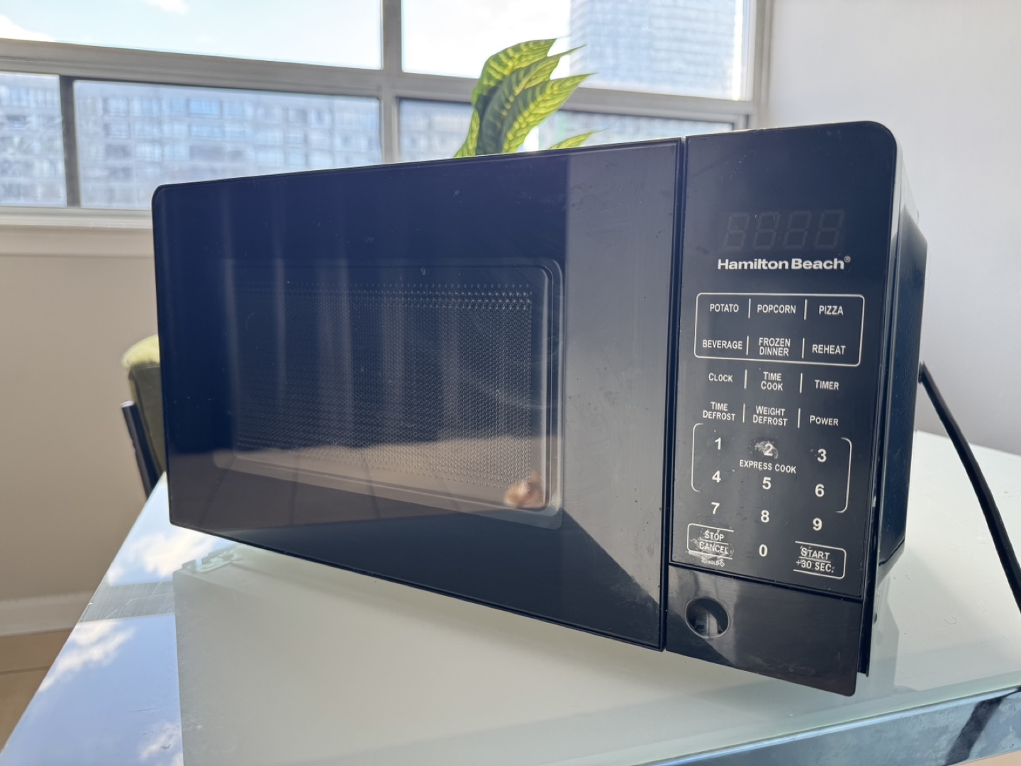 Microwave - brand: Hamilton Beach Black 0.7 cu ft.