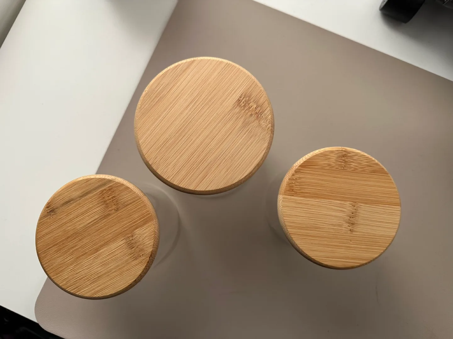 Set of three glass canisters with bamboo lids image indicator(2)