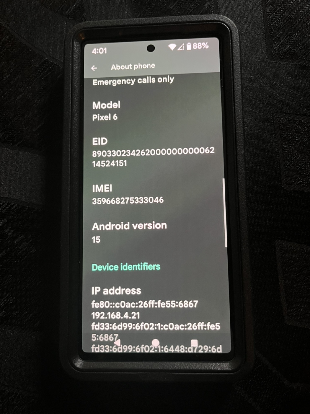 Google Pixel 6 in OtterBox case with charger