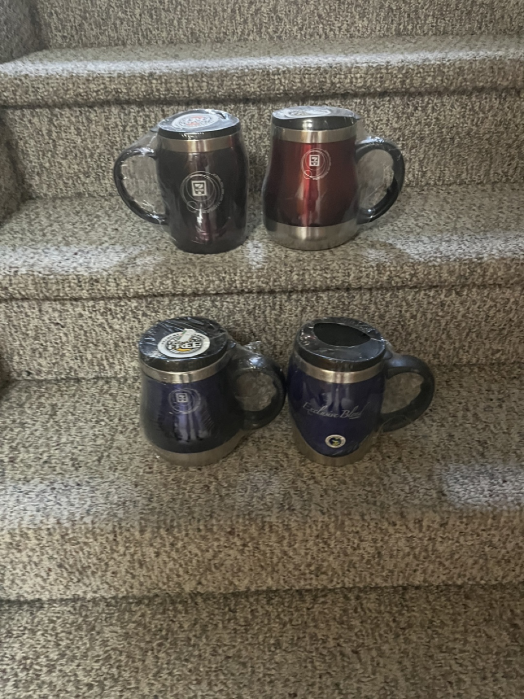 Set of four 7/11 travel mugs