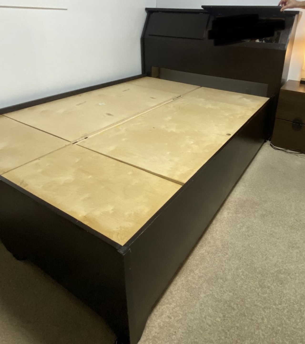 Dark brown double bed frame with headboard and storage