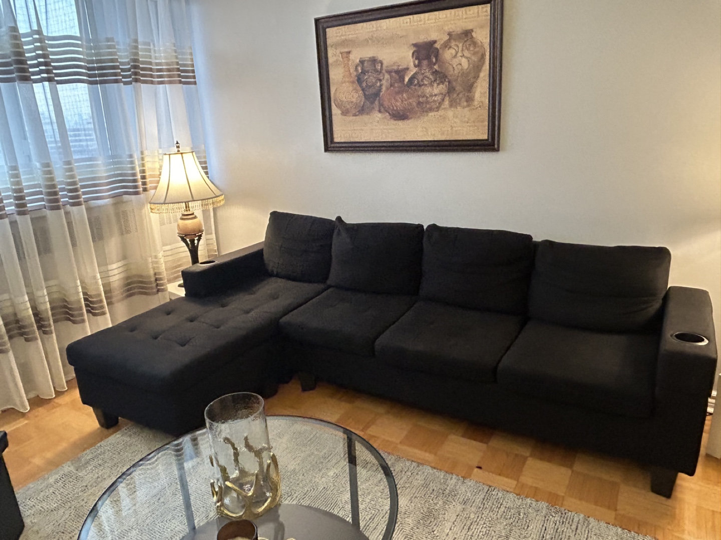 Black L-Shaped Sectional Sofa with Cup Holders