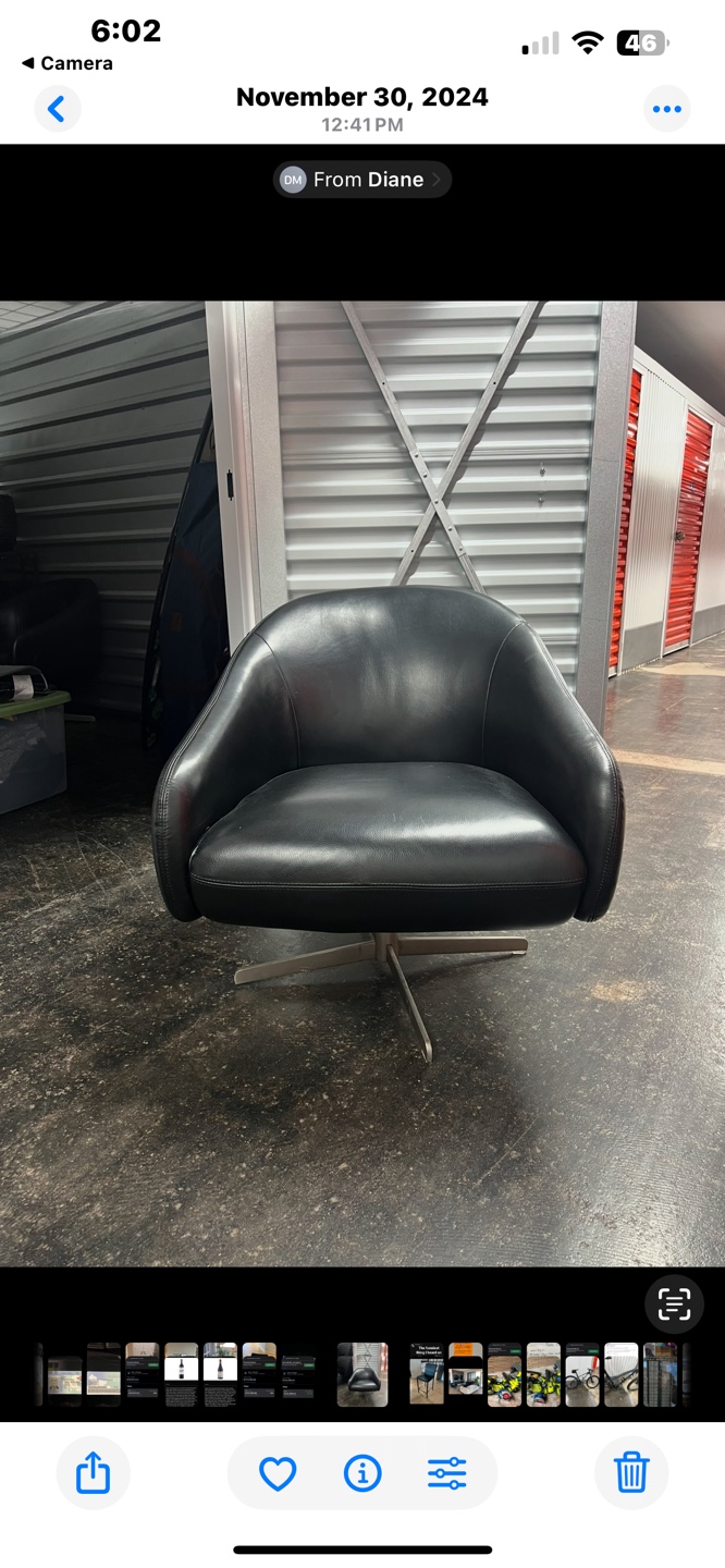Two Black Leather Swivel Chairs