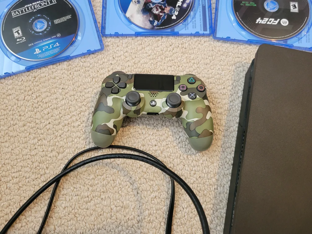 PS4 Console with 2 Controllers, 6 games & accessories image indicator(4)